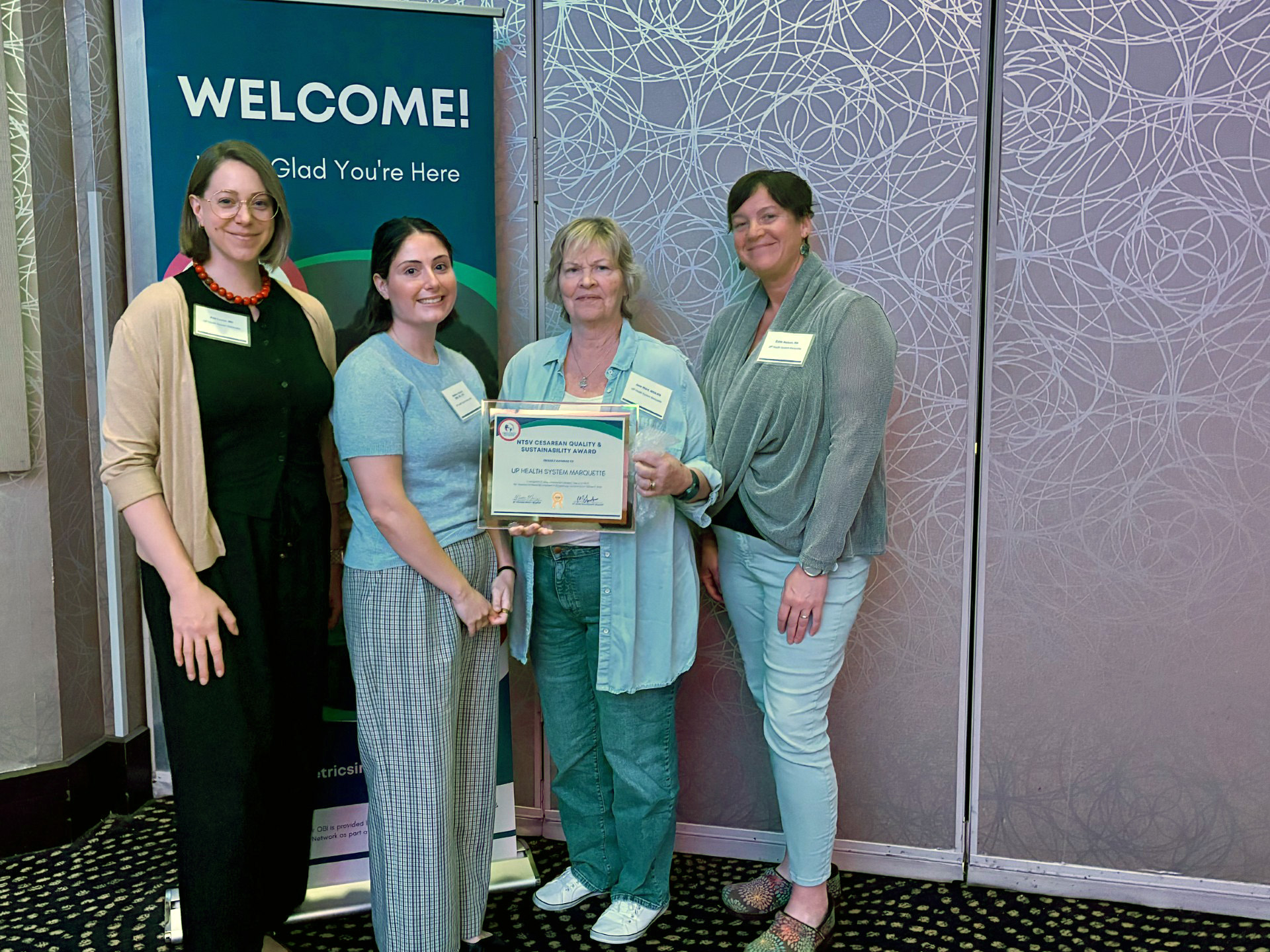 UP Health System Marquette team with 2026 OBI award